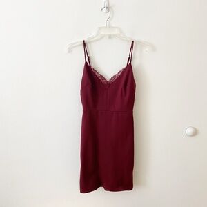 Lush burgundy mini bodycon dress with lace